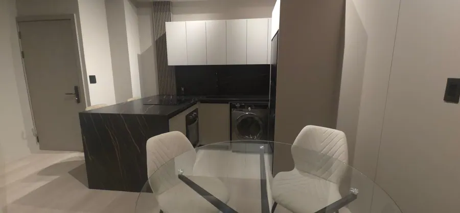 The Living Room Suite kitchen island and dining area.
