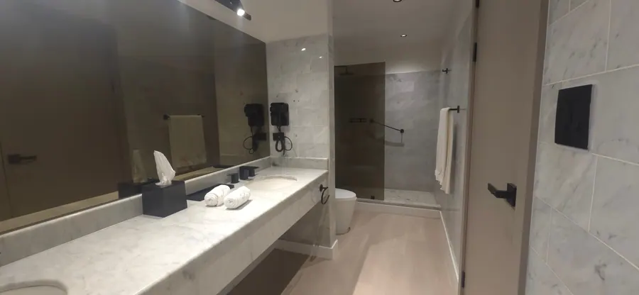 The Living Room Suite marble bathroom.